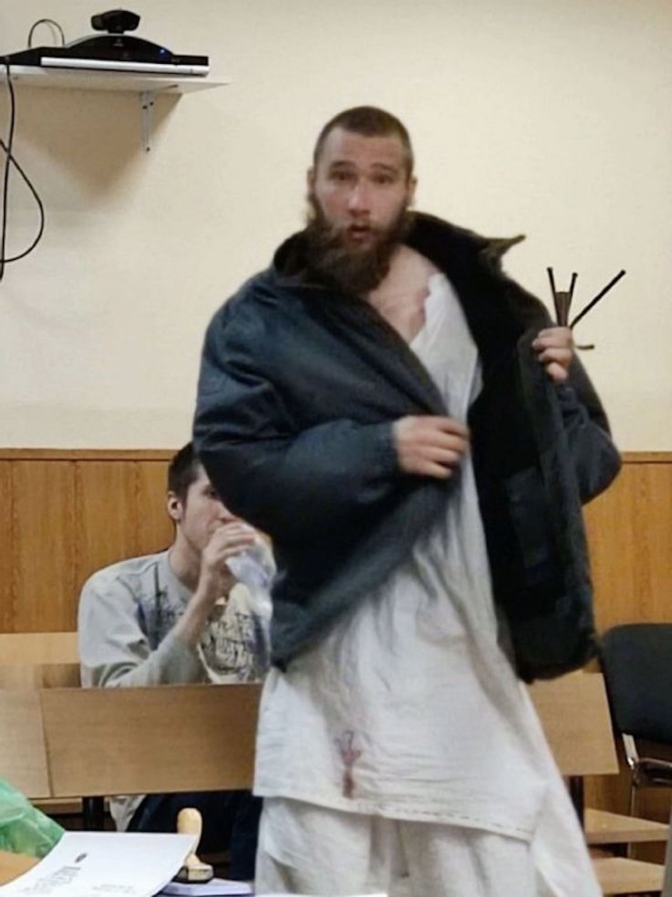 Dmitry Platon who hung anti-war banner