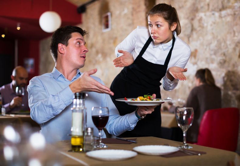 Waitress and customer in disagreement