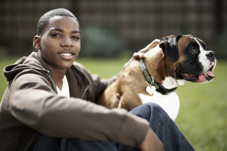 Teen boy with dog