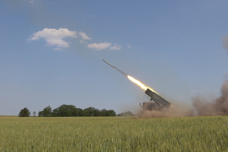 A rocket launcher fires in Ukraine