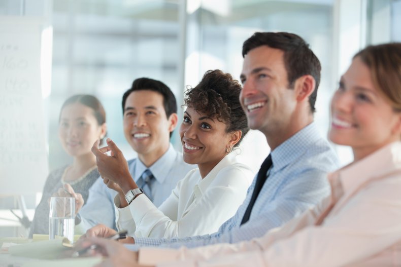 People sitting in a business meeting.