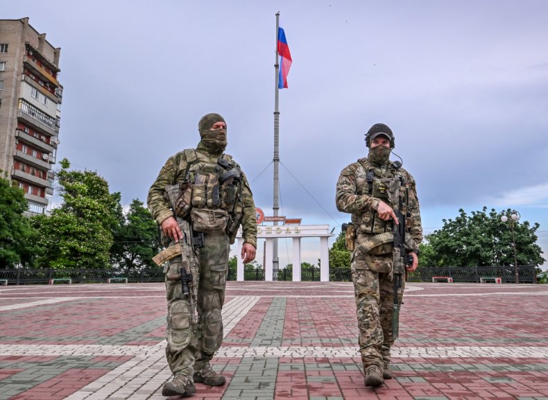 Russian troops patrol Melitopol Ukraine invasion