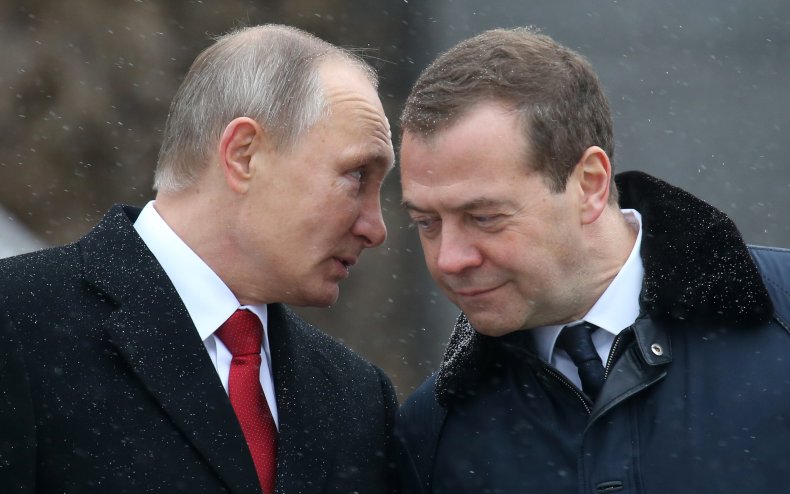 Russian President Vladimir Putin and Dmitry Medvedev