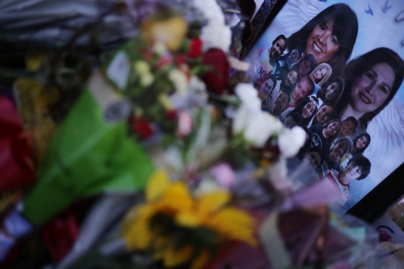 Flowers and photographs are seen