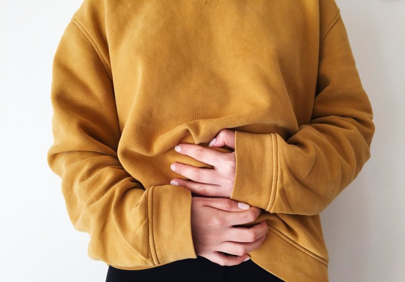 Person holding stomach