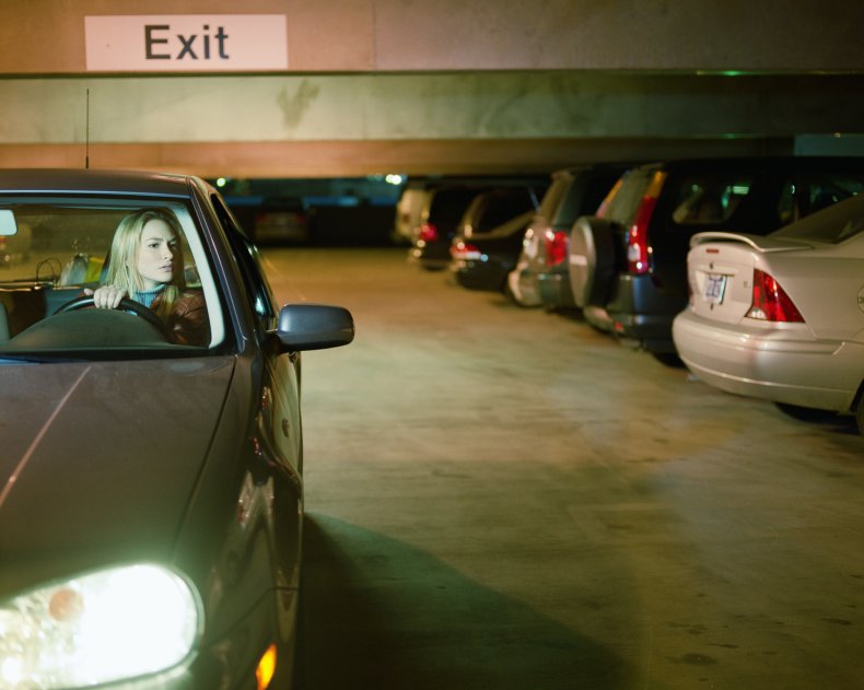 Woman looking for parking space