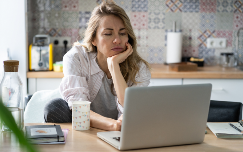 A woman working from home.