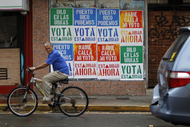A man rides his bicycle