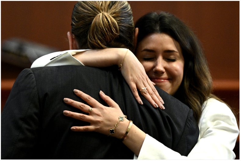 Camille Vasquez hugs Johnny Depp in court