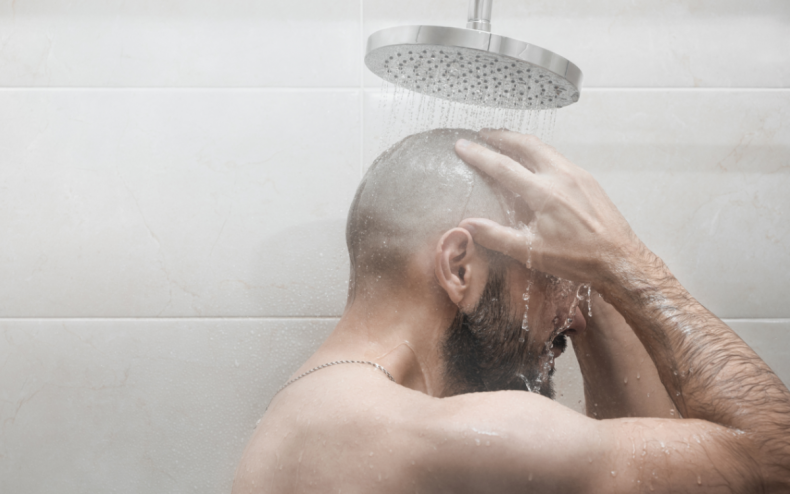 A man having a shower.