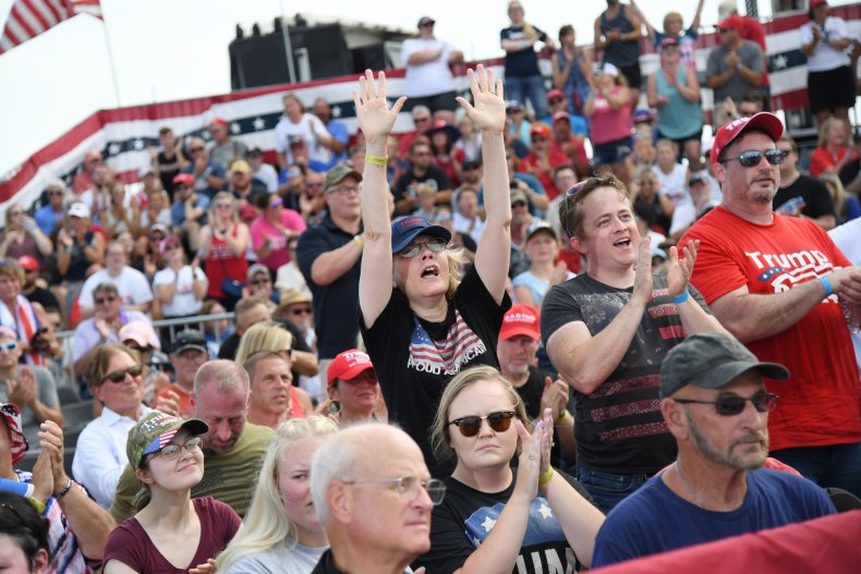 A crowd at the Illinois rally cheers