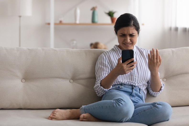 Confused woman on phone