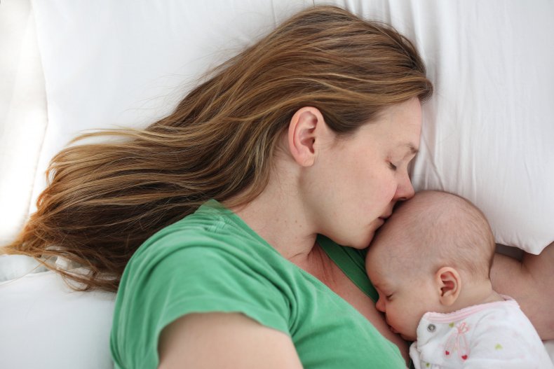 Sleeping mother and baby