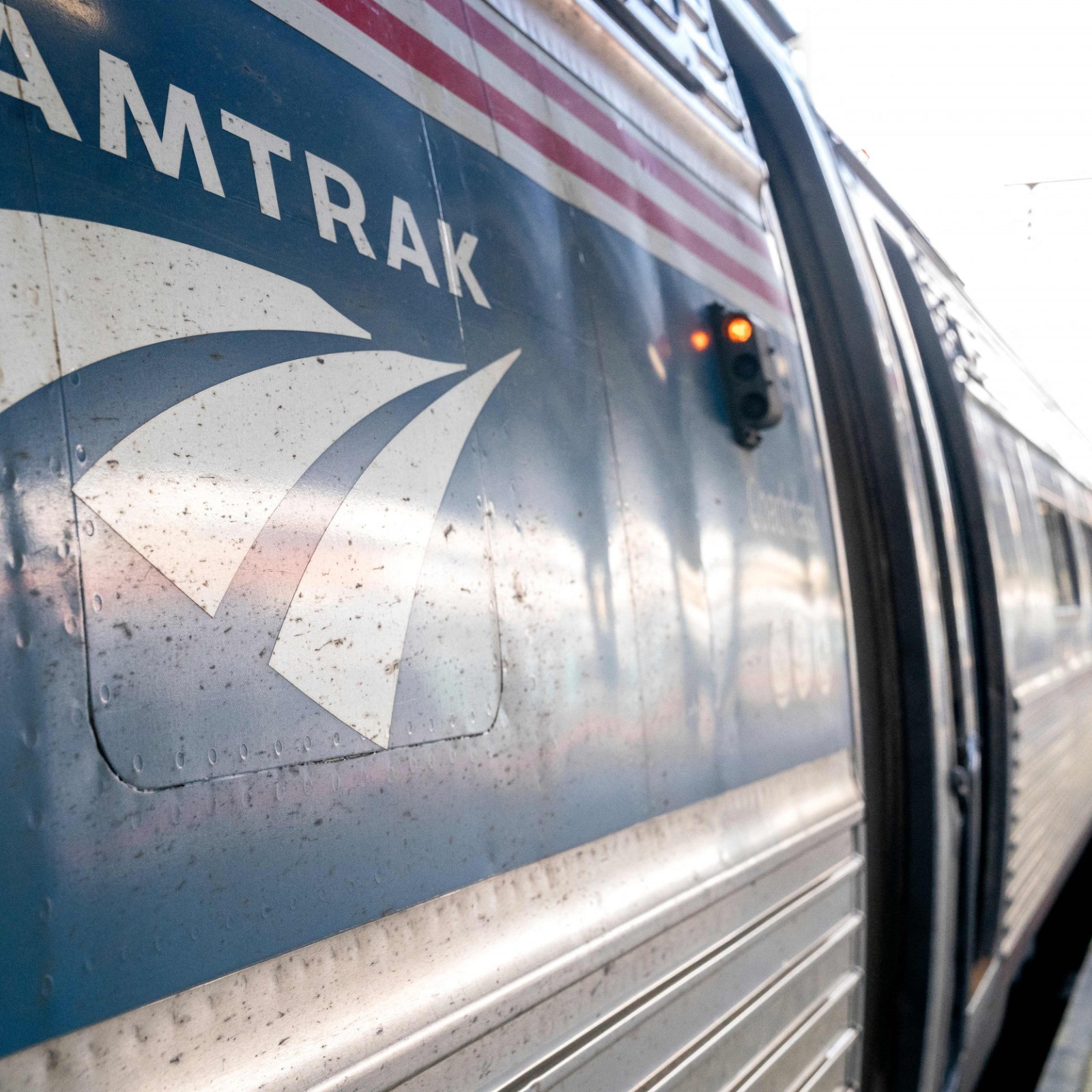 Photos of Amtrak Derailment Show Train Flipped After Dump Truck Collision