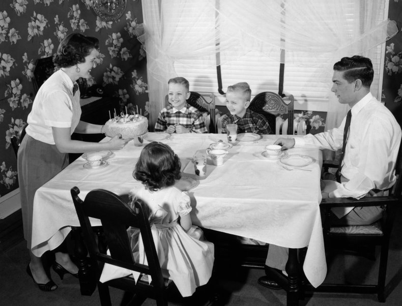 File photo of family eating dinner.