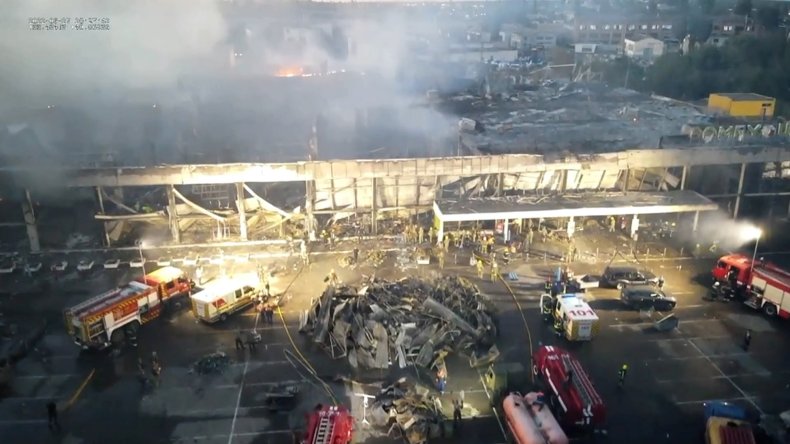 Ukrainian Rescuers Show Shopping Center Devastation After Russian Strike