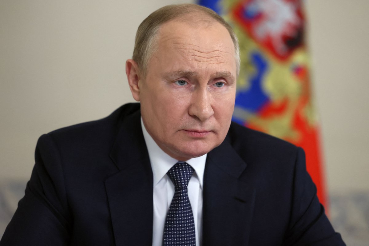 Vladimir Putin attends a security meeting 
