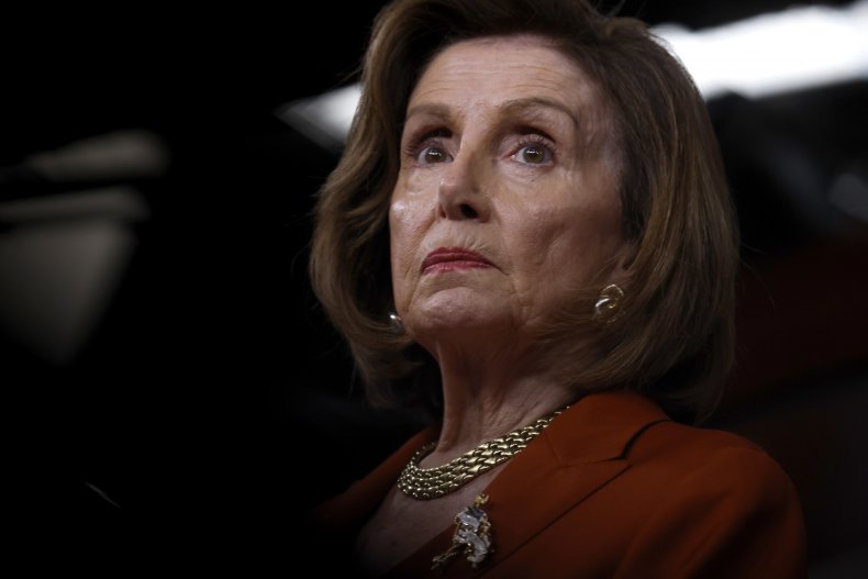 Nancy Pelosi speaks with reporters