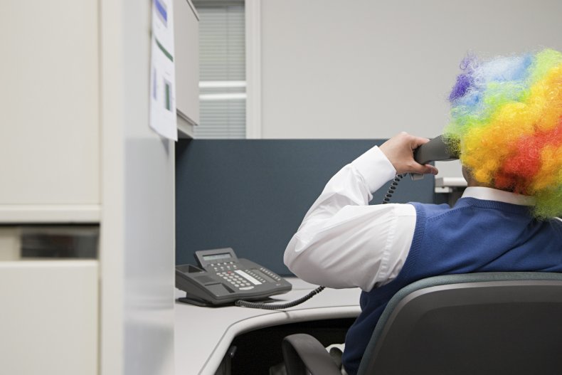 Office worker in clown wig