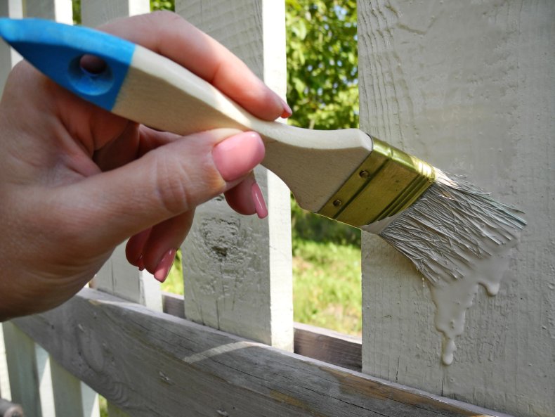 File photo of fence painting. 