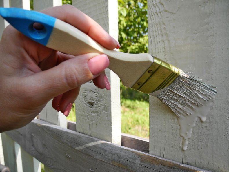 File photo of fence painting.