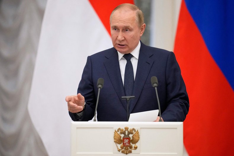 Vladimir Putin speaks during a press conference