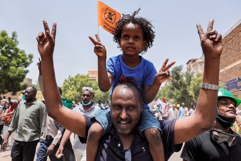 An anti-coup protester chants slogans