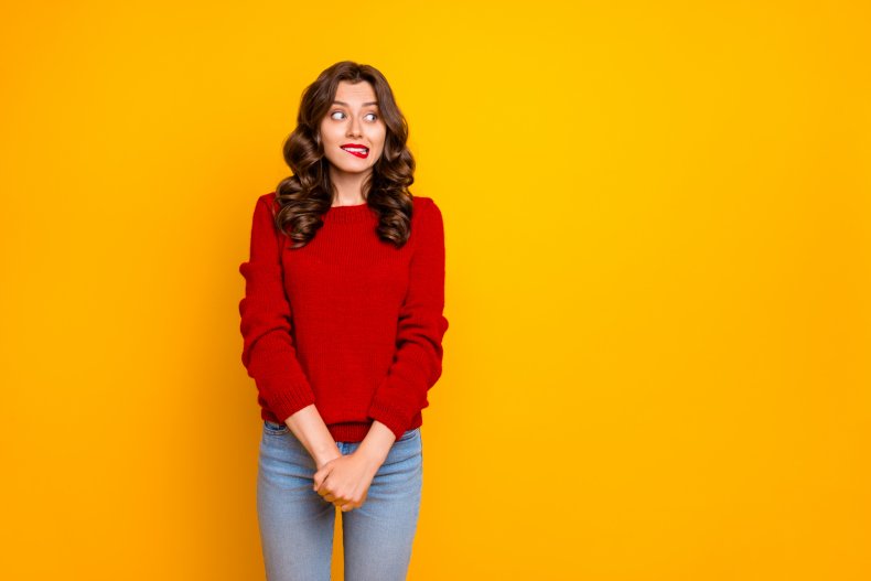 Woman against yellow background