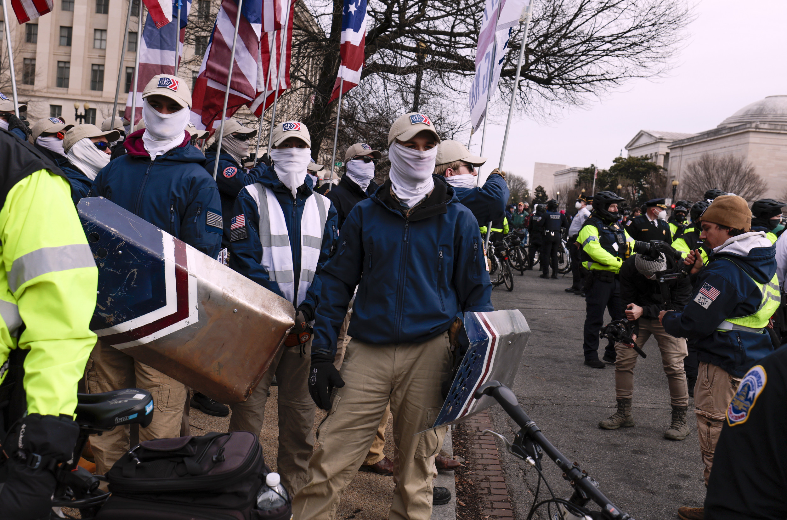Masked White Supremacist Group Marches Through Boston, Stirs Outrage thumbnail