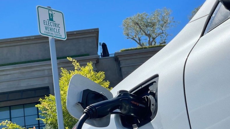 Electric car charging in mall parking lot