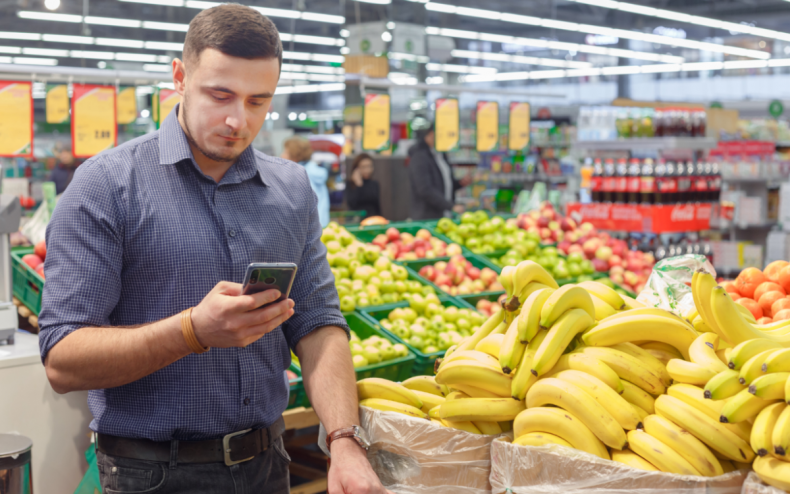 A man reading a text message.