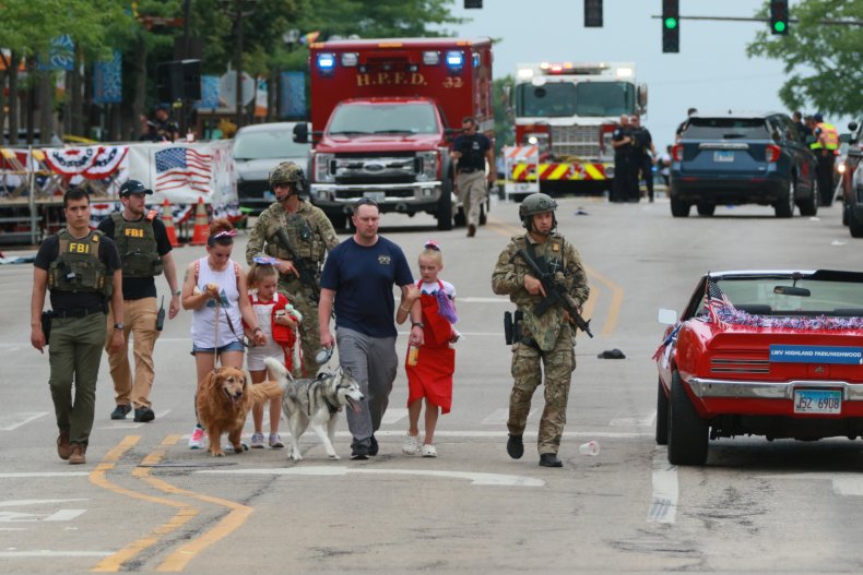 Law enforcement escorts a family 