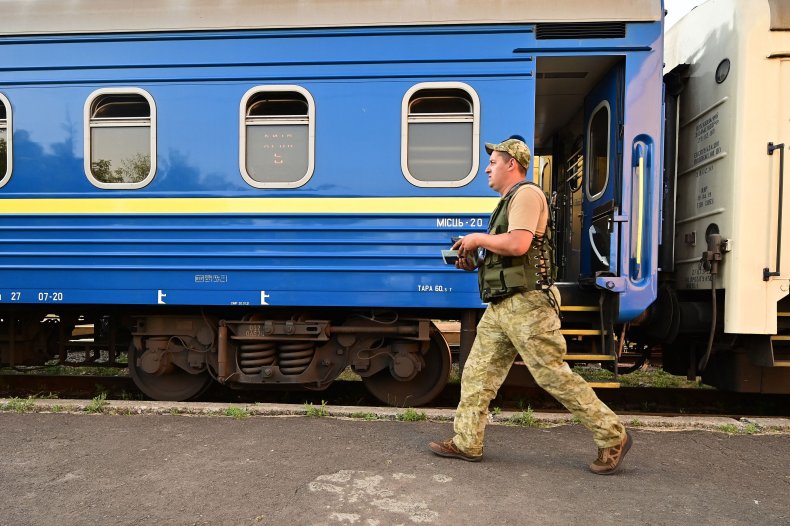 Ukrainian soldier works at a checkpoint