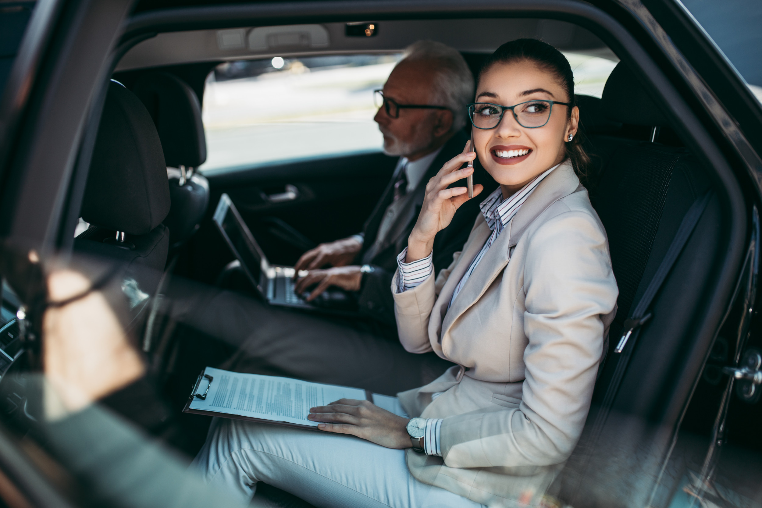 coworker sitting on backseat