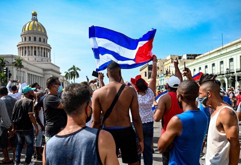 Cubans are seen outside Havana's Capitol