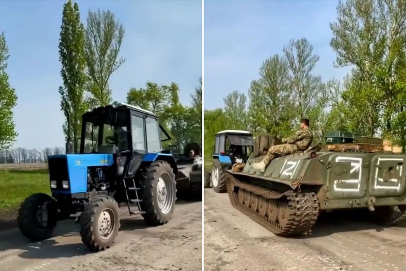 A Ukrainian tractor pulls a Russian vehicle