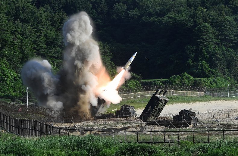 M270 MLRS fires a rocket 