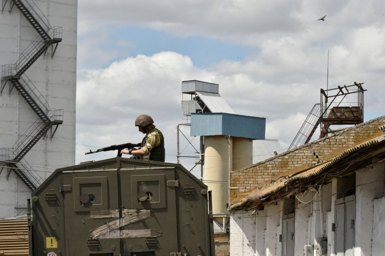 Russian Solider Near Grain Silo