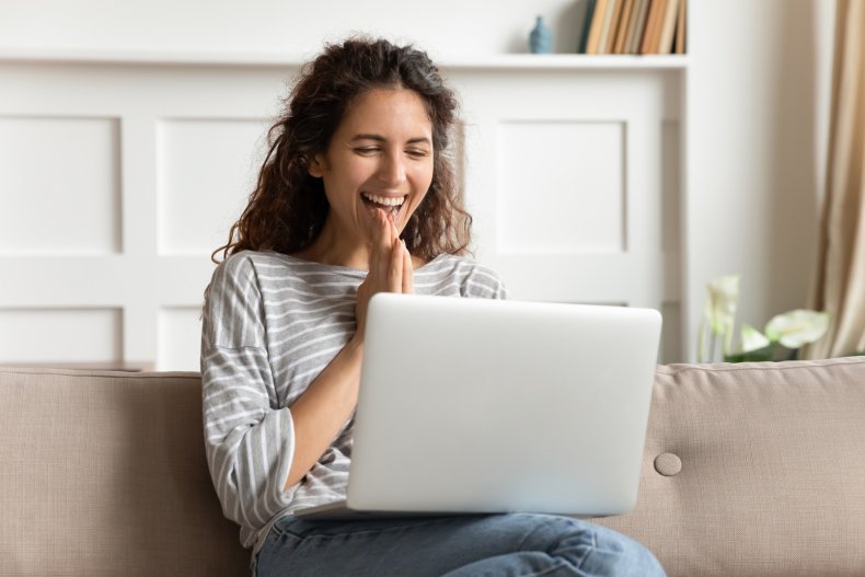 Happy woman on computer