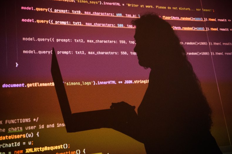 Shadow of a developer in front text