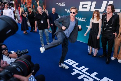 Brad Pitt Playfully Kicks Photographers Bullet Train Brad Pitt Playfully Kicks Photographers Bullet Train