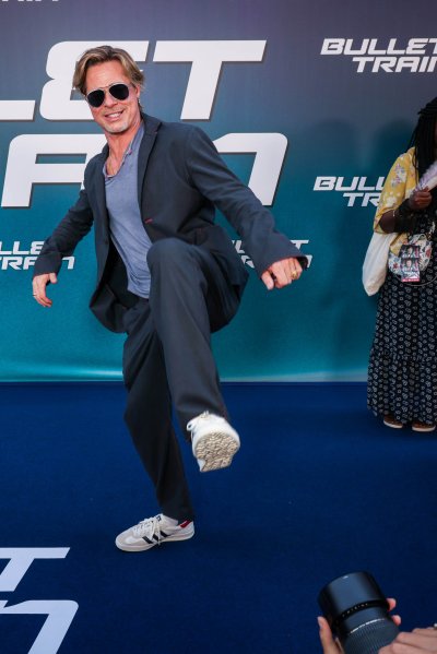 Brad Pitt Playfully Kicks Photographers Bullet Train Brad Pitt Playfully Kicks Photographers Bullet Train