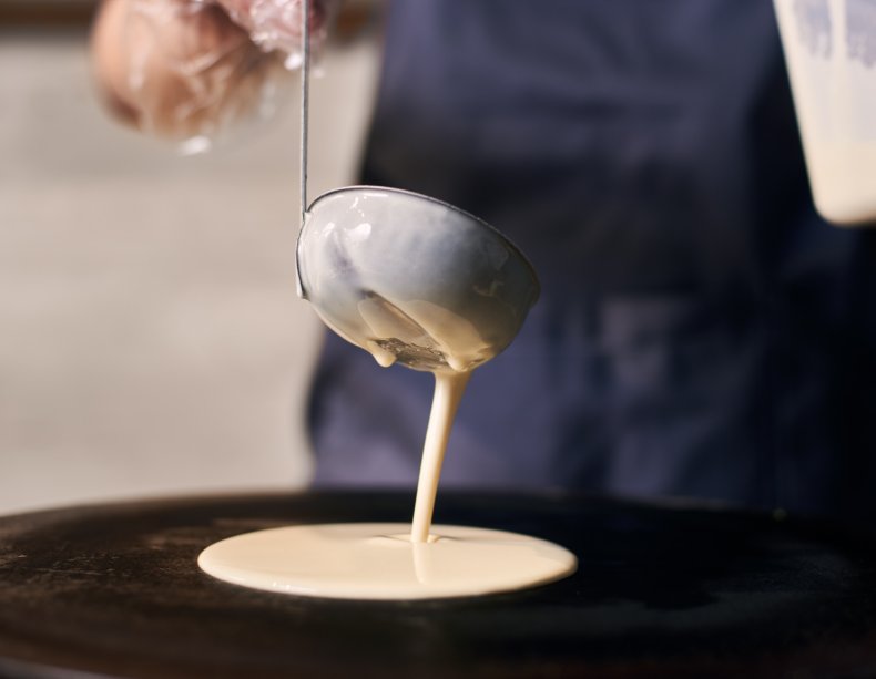 Woman making pancakes