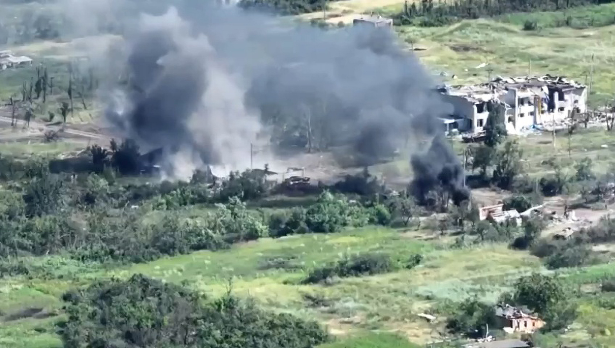 Watch: Ukrainian Troops Bomb Russian Military Gear in Rural Village