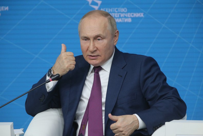 Vladimir Putin speaks during a forum 