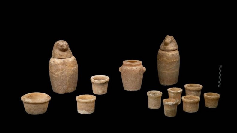 Canopic jars and ceremonial cups from tomb