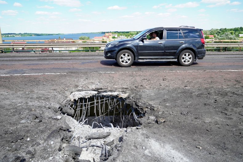 Kherson bridge damaged by HIMARS strike Ukraine