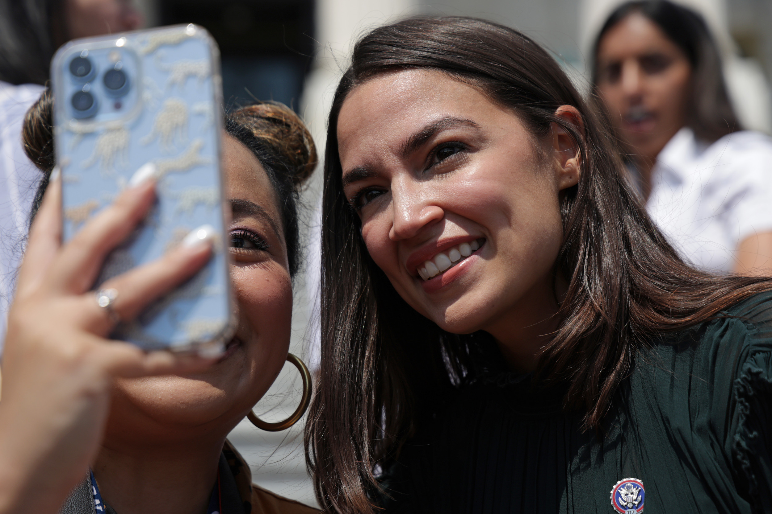 Gop Candidate Filmed Joking About Aoc Harassment With Young Son 