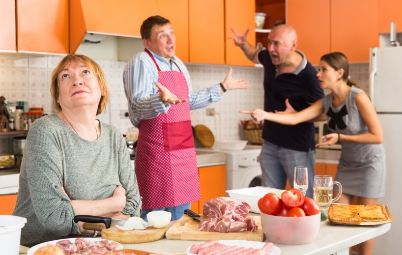 Family arguing in the kitchen.