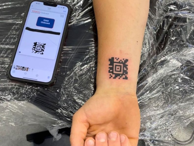 Dean Mayhew's arm QR code scanned